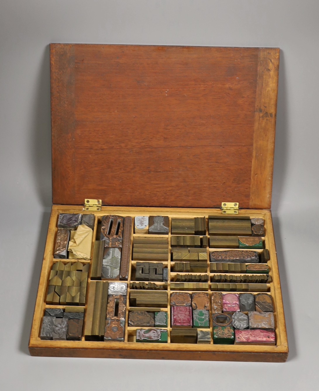 A mahogany cased collection of printing blocks